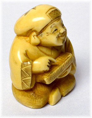 Дайкоку, один из Семи Богов Счастья, антикварная нэцкэ из слоновой кости